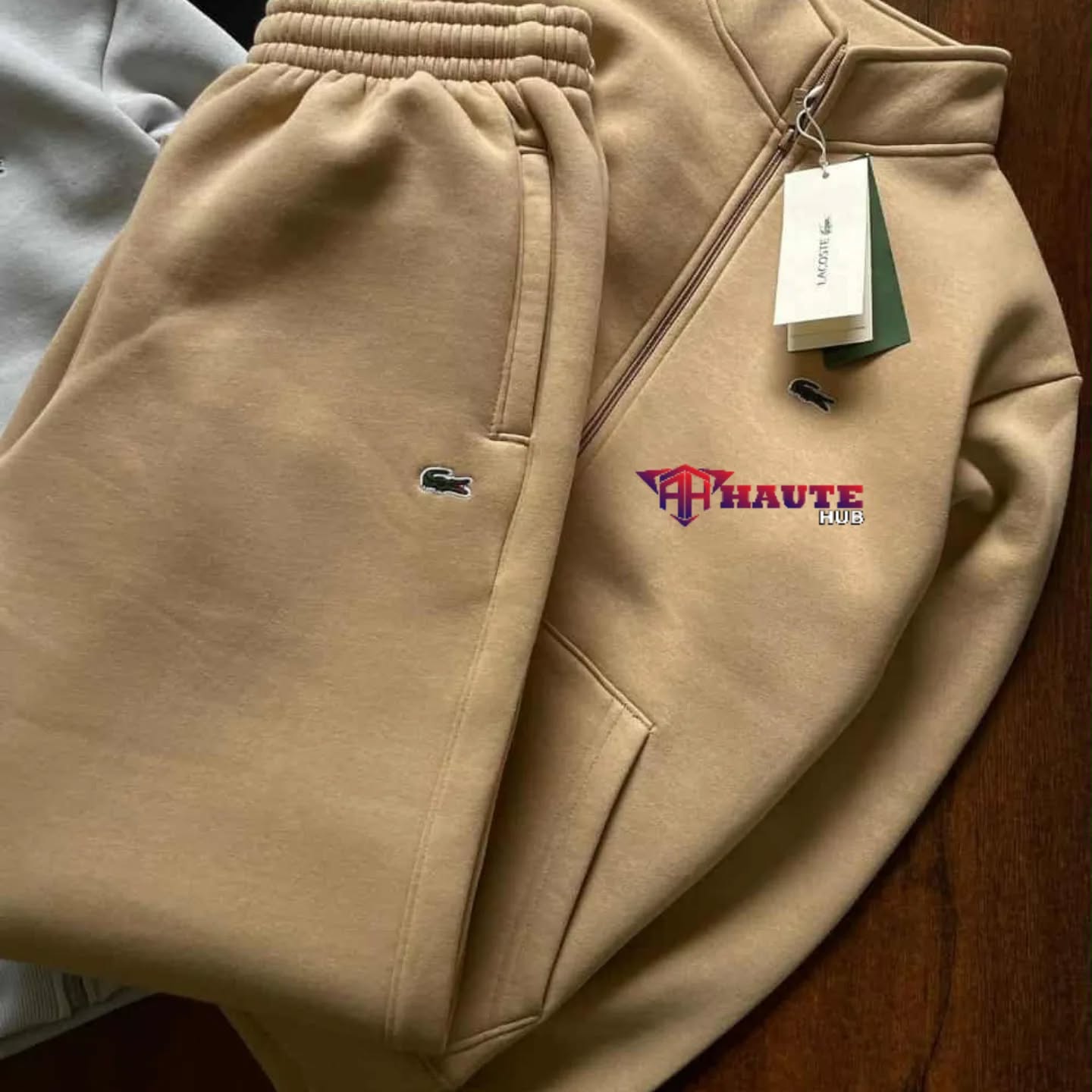 586684041_17845766619613317_7977828160209556882_n A matching set including a zip-up hooded sweatshirt and jogging pants. - Image 1